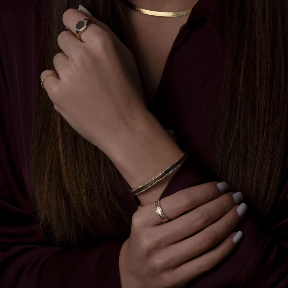 Diamond Border Ring, Bangle Bracelet, and Signet Ring Collection on Model