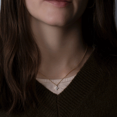 14k yellow gold diamond starflower necklace worn on model