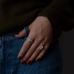 14k yellow gold puffed diamond band, engagement ring, and baguette ring worn on hand